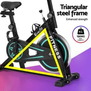stationary Everfit exercise bike with black frame, yellow-highlighted triangular steel structure, FITNESS branding, and circular graphic showing 150kg max weight capacity against purple gradient background