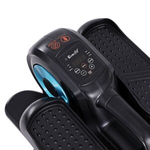 close-up of Everfit mini stepper featuring black frame with blue flywheel accent, textured foot pedals for grip, and control panel with digital screen and safety icons