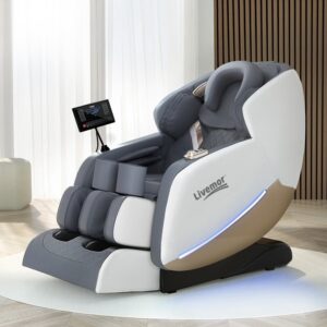 modern Livenor massage chair in white, gray, and beige with padded headrest, arm and leg sections, flexible control panel arm, and blue LED side light, placed in a contemporary well-lit room