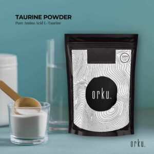 Orku Taurine Powder product display with black pouch featuring white topographic pattern and central orku™ branding, labeled Pure Amino Acid L-Taurine, shown with glass container of white powder, wooden spoon, and glass of water