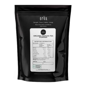 Orku Organic Matcha Tea Powder black resealable pouch with white and grey label, showing nutrition panel with 30g protein and 33g carbs per 100g, certified organic ACO and produced in Australia, branded for strength, power, vitality, and energy
