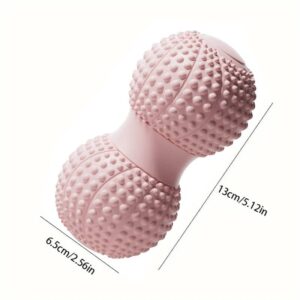 Pink peanut-shaped duo-massage ball with raised textured bumps, labeled with dimensions 6.5 cm diameter and 13 cm length, designed for muscle stimulation and spine support