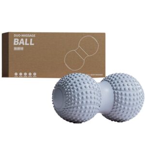 Grey peanut-shaped duo-massage ball with raised bumps for stimulation, shown next to brown box labeled DUO-MASSAGE BALL with line illustration and multilingual usage icons