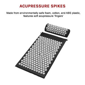 Black acupressure mat and pillow set with white spike discs; inset text highlights eco foam, cotton, and ABS plastic construction