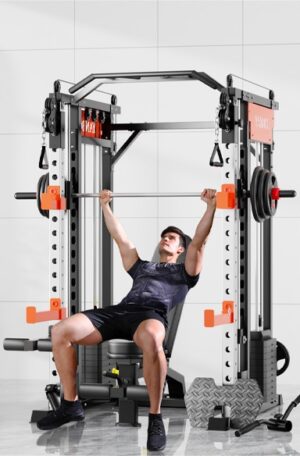man in athletic wear performing incline bench press with barbell on smith machine, targeting upper chest and shoulders in gym environment