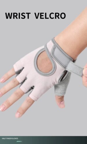 hand wearing light gray fingerless glove with oval cutout and gray trim, shown adjusting wrist strap for secure fit during training