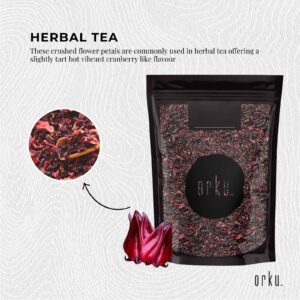 orku™ Herbal Tea pouch with close-up of crushed petals and whole flower reference on textured background