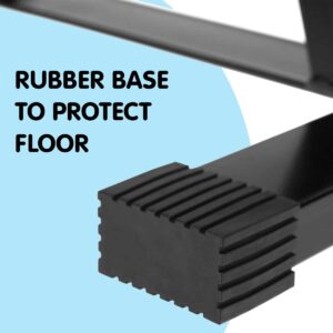 Close-up of rubber base on a weight plate storage rack designed to protect floors and provide stability in a home gym.