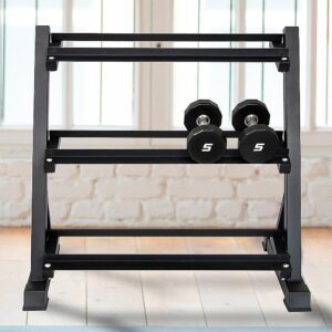 Three tier dumbbell storage rack placed in a home gym environment, showing sturdy steel construction and compact design with dumbbells stored on the middle tier.