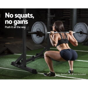 Woman performing barbell squats on an Everfit squat rack during lower body strength training workout