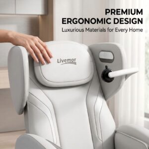 Close-up view of a white Livemor massage chair highlighting its premium ergonomic design and smooth upholstery. A hand is shown resting on the cushioned headrest pillow with the Livemor logo, while the side panel includes a built-in speaker and an adjustable mounted control arm. The background features a softly lit indoor setting, emphasizing comfort and modern styling, along with visible text reading “Premium Ergonomic Design – Luxurious Materials for Every Home.”