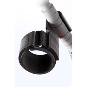 Close-up of a weight lifting hook attached to a barbell, showing padded wrist support and secure grip assistance for heavy strength training