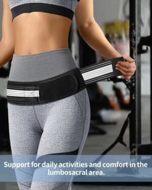 Woman adjusting a sacroiliac joint support belt during exercise, showing lightweight compression support for the pelvis, hips, and lower back during daily movement and workouts.