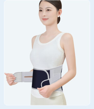 Woman adjusting breathable size M lumbar support belt with elastic compression straps for lower back support and posture correction.