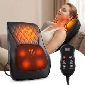 Black Livemor back massager cushion with glowing heat areas, remote and a woman reclining on a sofa.