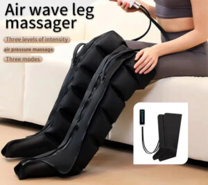 Seated person wearing black leg massager boots with a wired controller, three massage modes and three intensity levels.