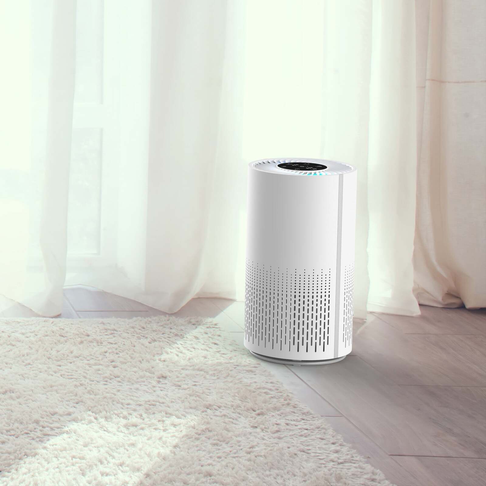 Lenoxx HEPA air purifier in a bright bedroom beside a rug and sheer curtains.