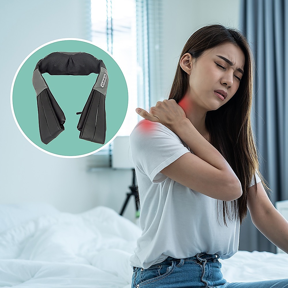 Neck and shoulder massager shown alongside a person holding their shoulder.