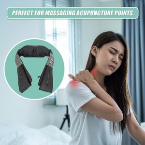 Black and grey neck massager shown beside a person holding their shoulder.